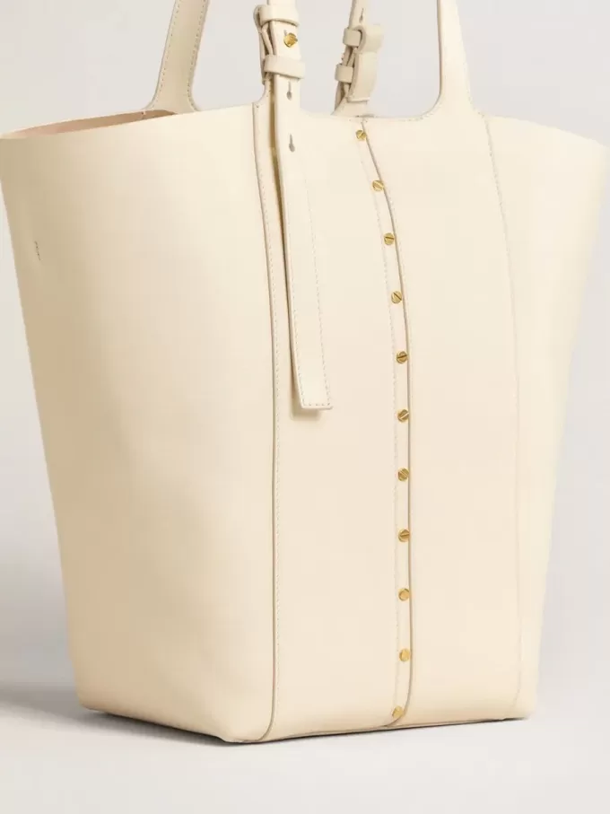 24/7 Bag North South i smörfärgat läder med justerbara handtag