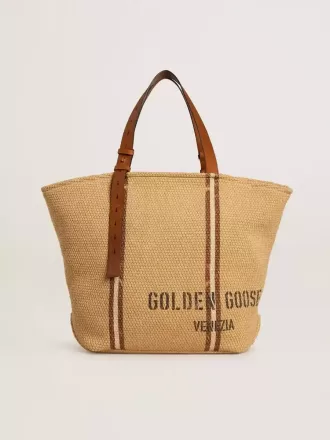 24,7 tote bag i naturlig raffia och brunt läder med guldmetalliska detaljer