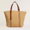 24,7 tote bag i naturlig raffia och brunt läder med guldmetalliska detaljer