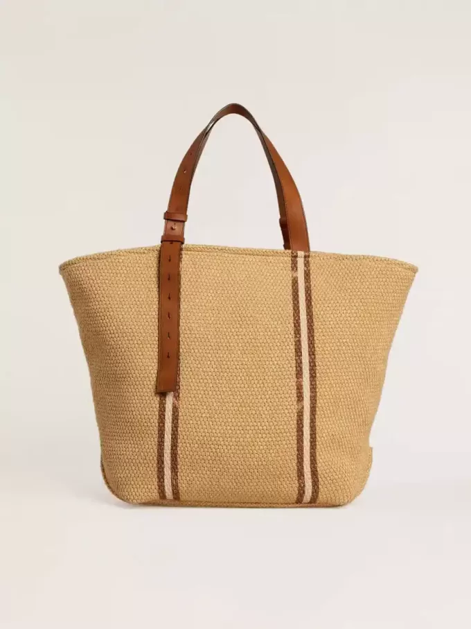 24,7 tote bag i naturlig raffia och brunt läder med guldmetalliska detaljer