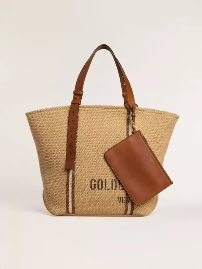 24,7 tote bag i naturlig raffia och brunt läder med guldmetalliska detaljer