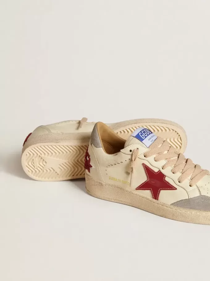 Ball Star LTD för damer i nappa med läderstjärna och silverfärgad mockahälflik Ball Star LTD för damer i nappa med läderstjärna och silverfärgad mockahälflik