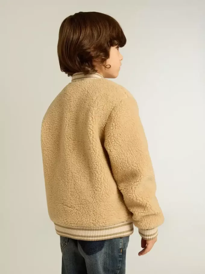 Beige bomberjacka i fleece för barn