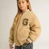 Beige bomberjacka i fleece för barn