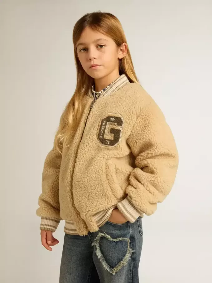 Beige bomberjacka i fleece för barn