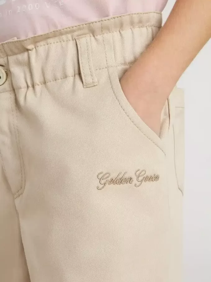 Beige bomullsbyxor för flickor med broderi Beige bomullsbyxor för flickor med broderi