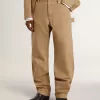 Beige byxor för herr med lappar Beige byxor för herr med lappar