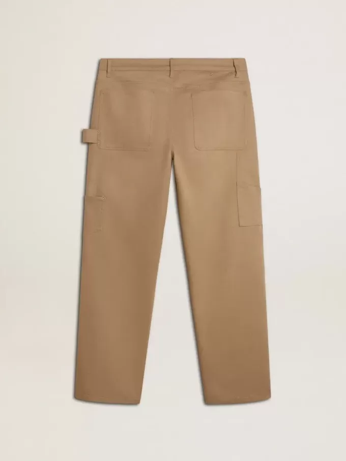 Beige byxor för herr med lappar Beige byxor för herr med lappar