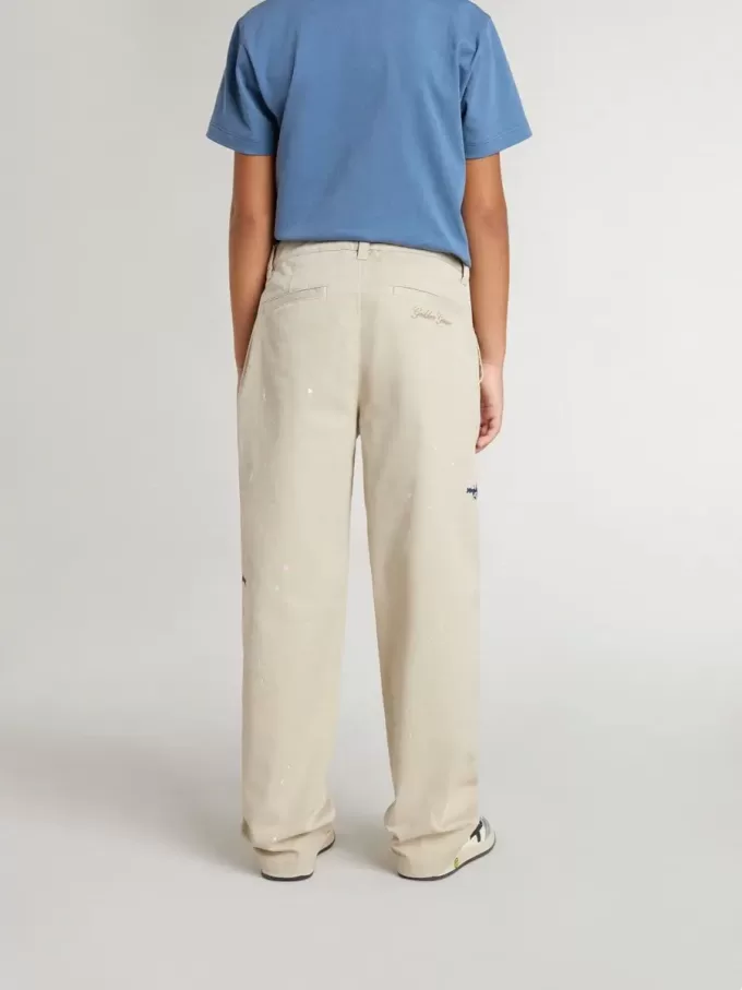 Beige chinosbyxor för barn med flerfärgade stänk