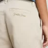 Beige chinosbyxor för barn med flerfärgade stänk