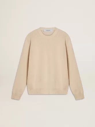 Beige damtröja med texten ”Golden” på ryggen