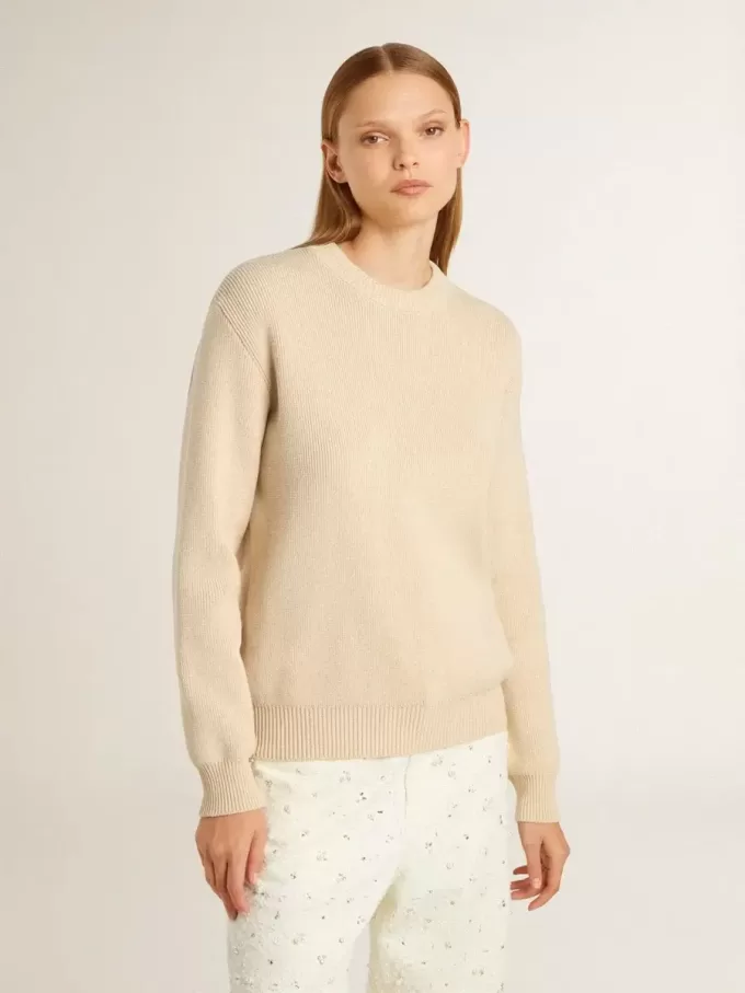 Beige damtröja med texten ”Golden” på ryggen Beige damtröja med texten ”Golden” på ryggen