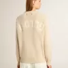 Beige damtröja med texten ”Golden” på ryggen Beige damtröja med texten ”Golden” på ryggen