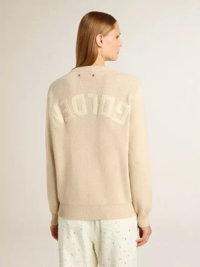 Beige damtröja med texten ”Golden” på ryggen Beige damtröja med texten ”Golden” på ryggen