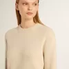 Beige damtröja med texten ”Golden” på ryggen Beige damtröja med texten ”Golden” på ryggen
