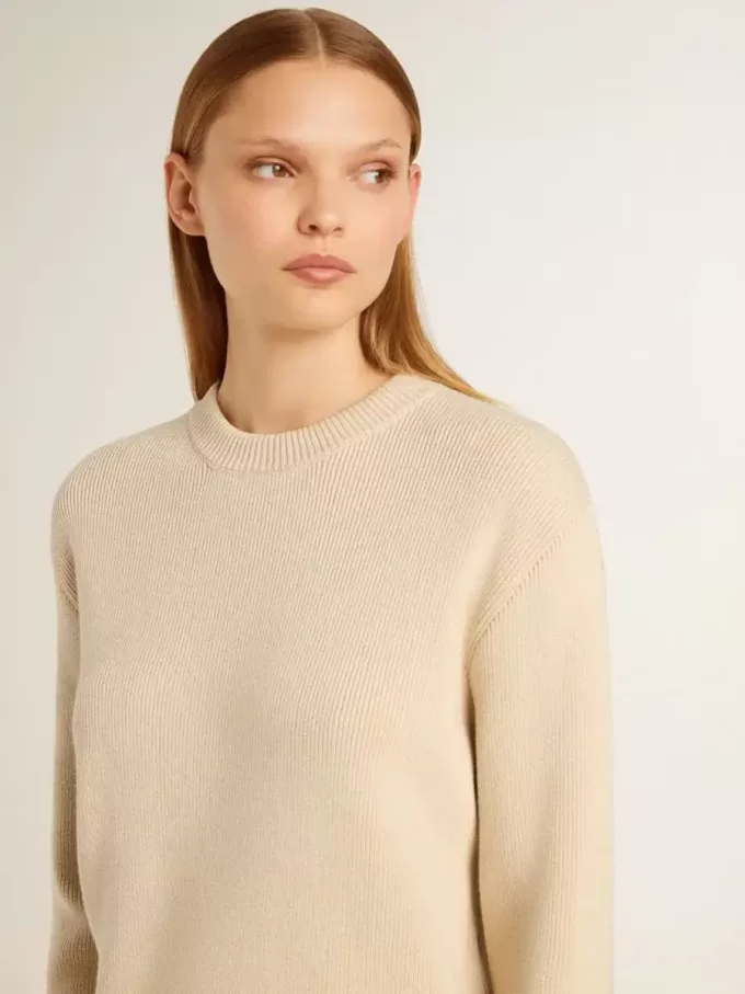 Beige damtröja med texten ”Golden” på ryggen Beige damtröja med texten ”Golden” på ryggen