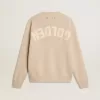 Beige damtröja med texten ”Golden” på ryggen Beige damtröja med texten ”Golden” på ryggen