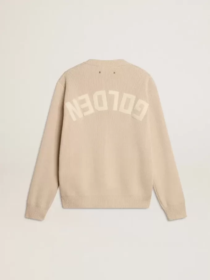 Beige damtröja med texten ”Golden” på ryggen Beige damtröja med texten ”Golden” på ryggen