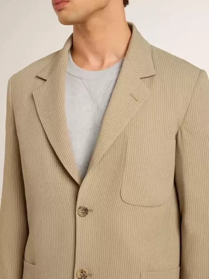 Beige enkelknäppt jacka för herr med oversized passform Beige enkelknäppt jacka för herr med oversized passform