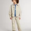 Beige jacka för barn med flerfärgade stänk