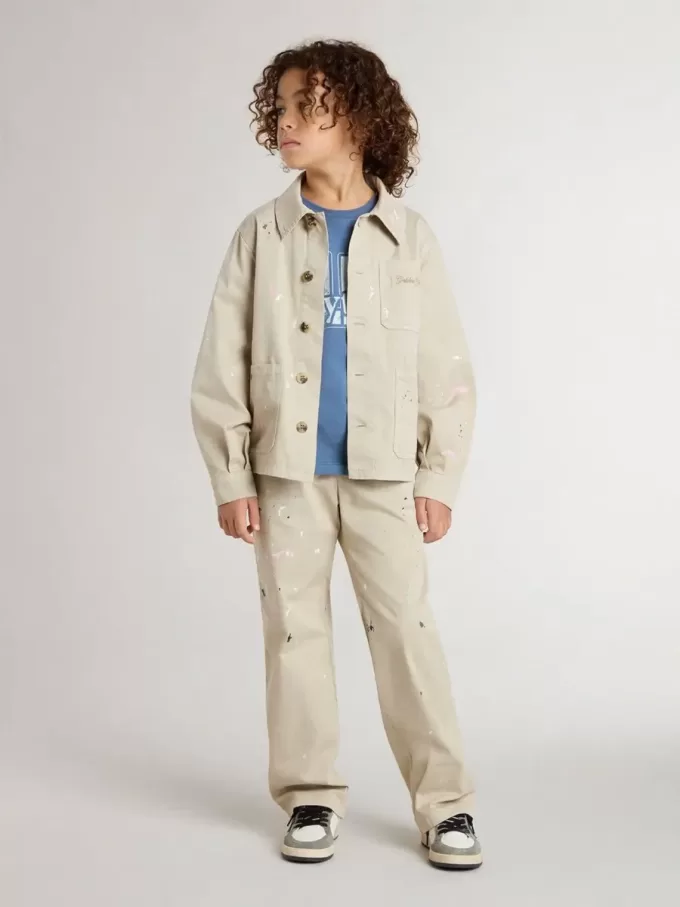 Beige jacka för barn med flerfärgade stänk