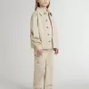 Beige jacka för barn med flerfärgade stänk