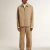 Beige jacka för herr med blommig brodyr och hel dragkedja