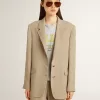 Beige randig enkelknäppt jacka för damer med oversized passform Beige randig enkelknäppt jacka för damer med oversized passform