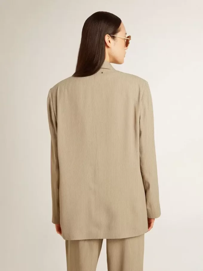 Beige randig enkelknäppt jacka för damer med oversized passform Beige randig enkelknäppt jacka för damer med oversized passform