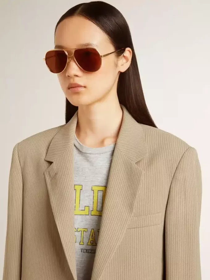 Beige randig enkelknäppt jacka för damer med oversized passform Beige randig enkelknäppt jacka för damer med oversized passform