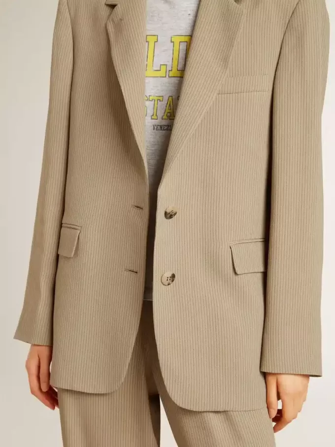 Beige randig enkelknäppt jacka för damer med oversized passform Beige randig enkelknäppt jacka för damer med oversized passform