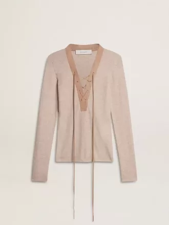 Beige ulltröja med läderdetaljer