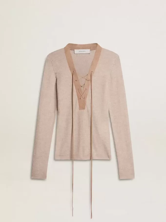 Beige ulltröja med läderdetaljer Beige ulltröja med läderdetaljer