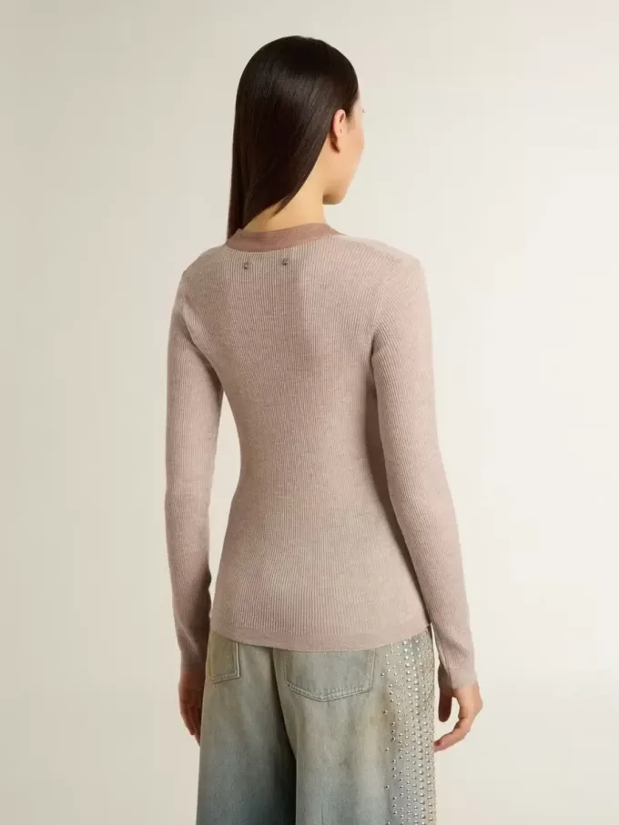Beige ulltröja med läderdetaljer Beige ulltröja med läderdetaljer