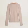 Beige ulltröja med läderdetaljer Beige ulltröja med läderdetaljer