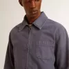 Blå jacka för herr i denim bomull med slitna detaljer