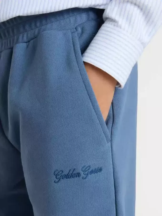 Blå joggingbyxor för barn med broderi