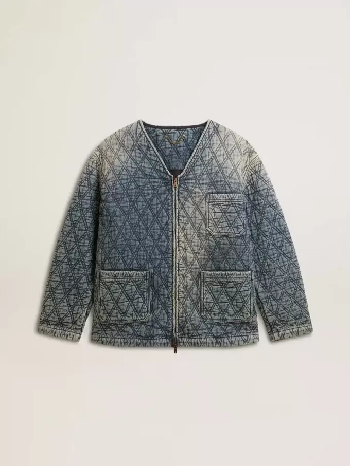 Blå quiltad jacka för dam i bomullsdenim med slitna detaljer
