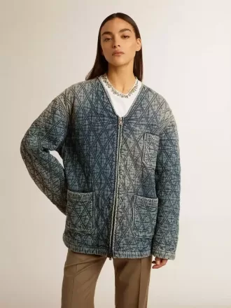 Blå quiltad jacka för dam i bomullsdenim med slitna detaljer