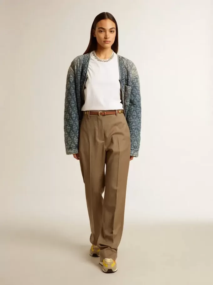 Blå quiltad jacka för dam i bomullsdenim med slitna detaljer