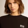 Black Star Collection T-shirt med kontrasterande vit logotyp och stjärna