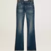 Bootcut-jeans för damer med vintage-tvätt och metalliska detaljer