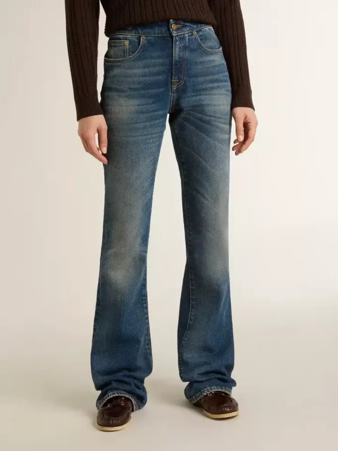 Bootcut-jeans för damer med vintage-tvätt och metalliska detaljer