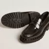 Chunky loafers för damer i svart läder med nitar