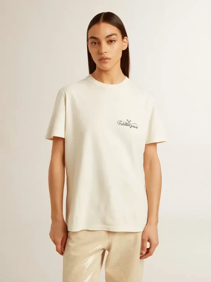 Dam-T-shirt i åldrat vitt med logotyp på bröstet