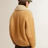 Damjacka i fårskinn med bred krage i shearling