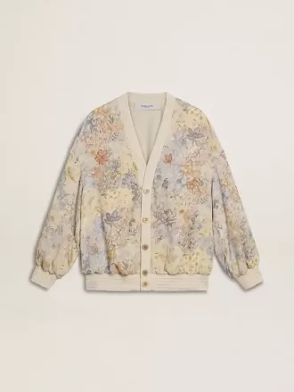 Damkofta med blommönster och broderier