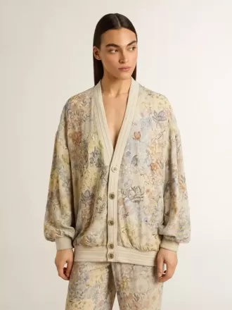 Damkofta med blommönster och broderier