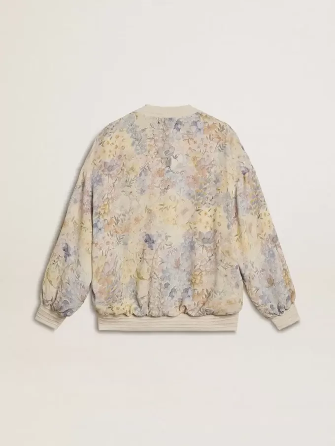 Damkofta med blommönster och broderier Damkofta med blommönster och broderier