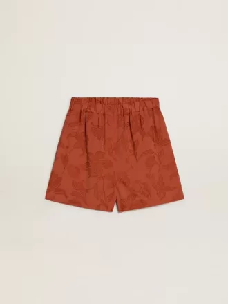 Damshorts i tegelröd jacquard med marint blommönster